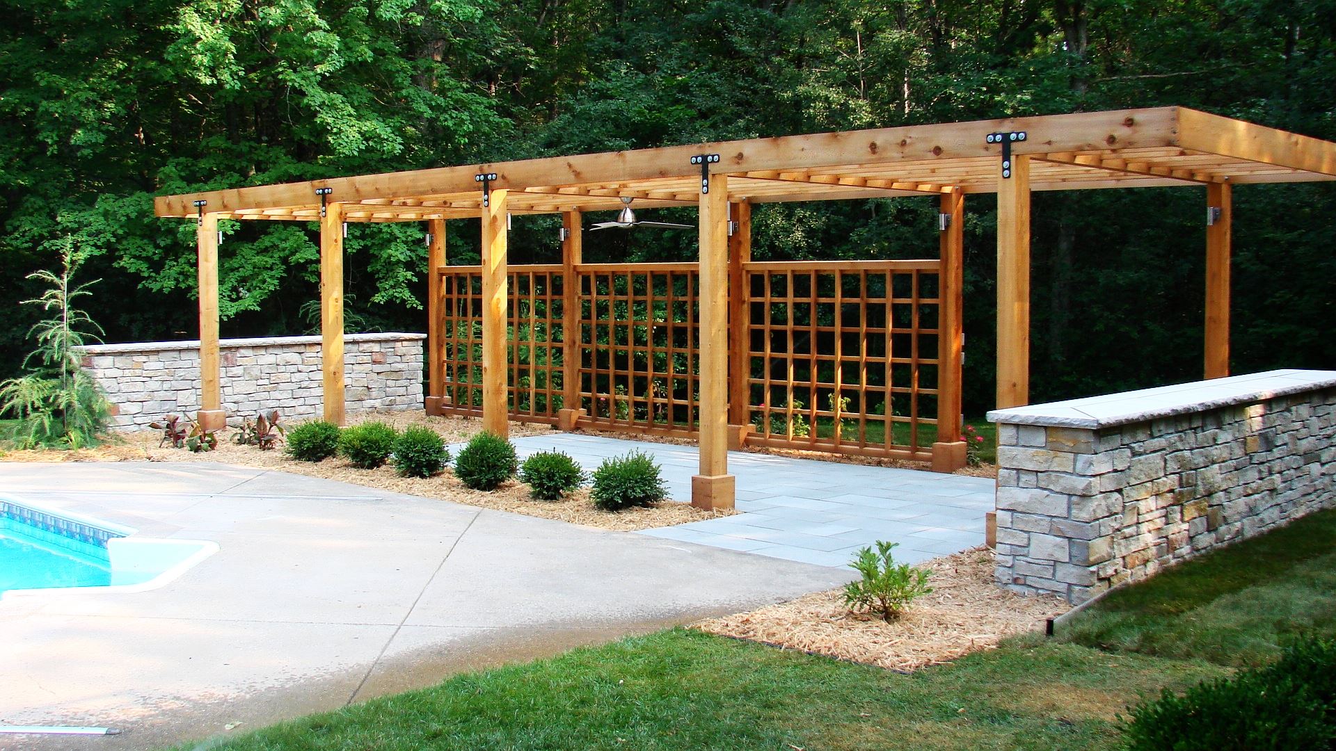 Landscape in Mahtomedi, MN - Pergola and Blue Stone Patio Project in Mahtomedi MN